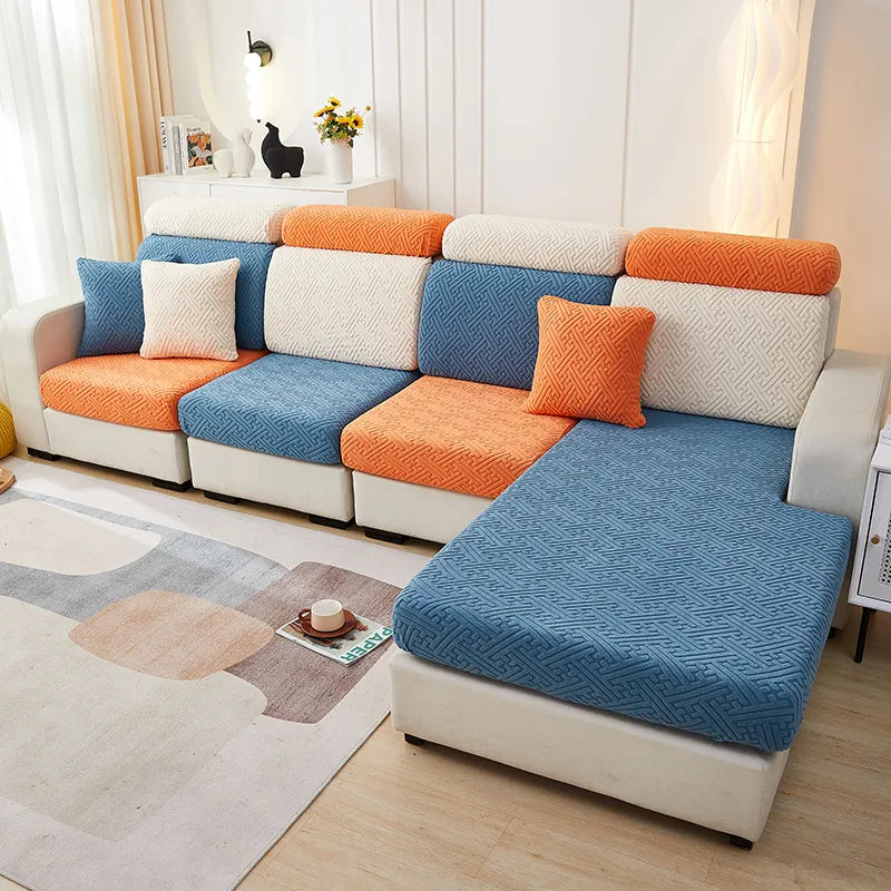 Housse orange de coussin de canapé extensible